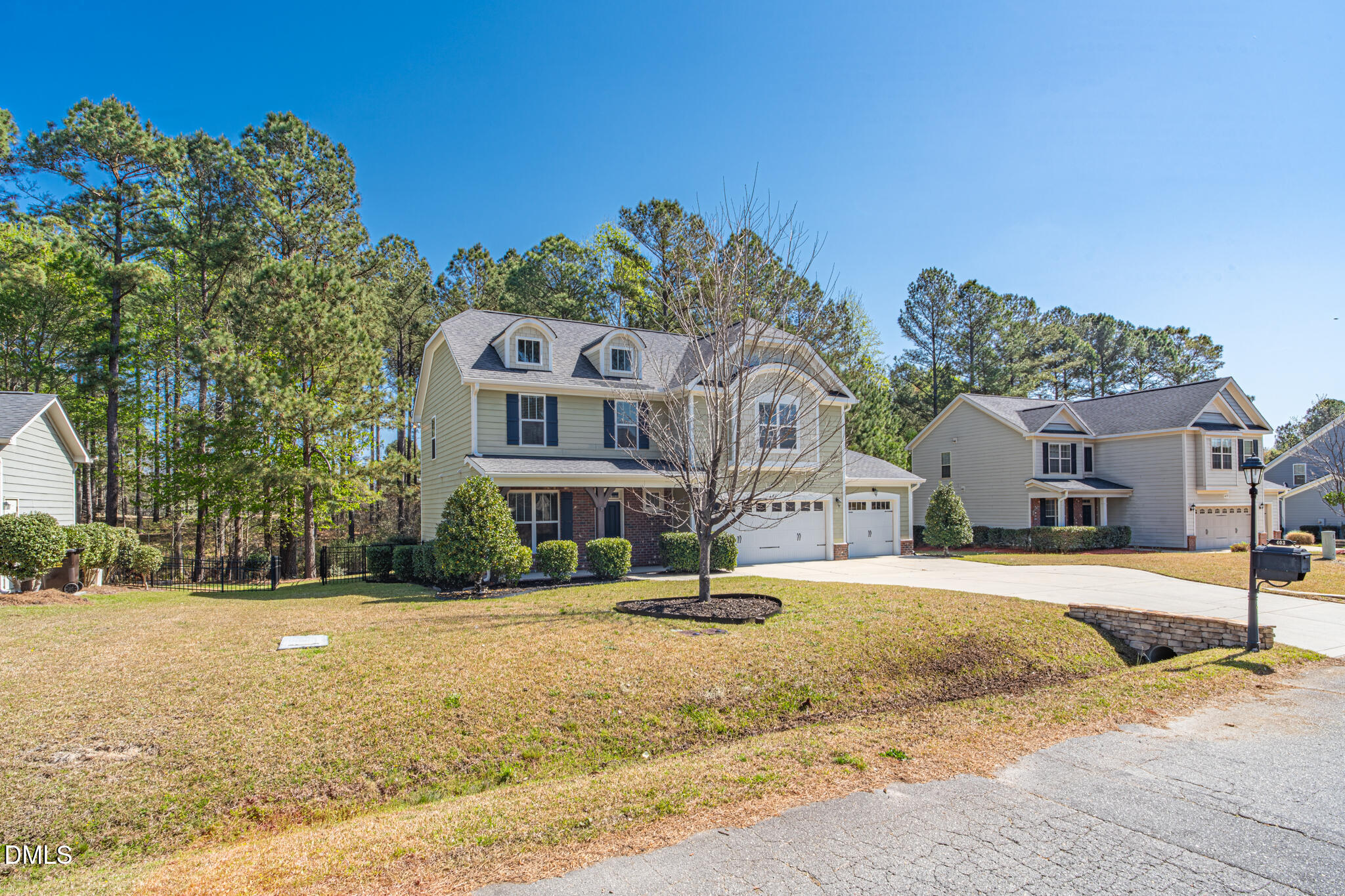 403 Rolling Pines Drive Spring Lake, NC 28390 - Photo 2 of 56 a front view of a house with a yard