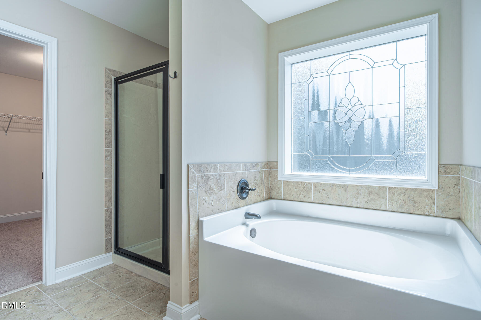 403 Rolling Pines Drive Spring Lake, NC 28390 - Photo 28 of 56 a white bath tub sitting next to a window