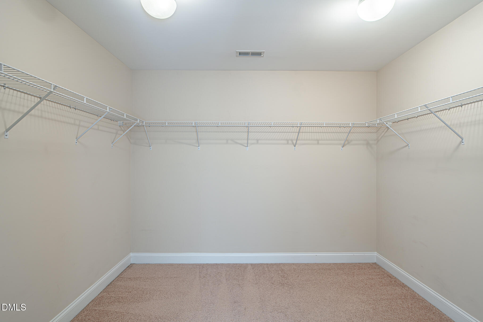 403 Rolling Pines Drive Spring Lake, NC 28390 - Photo 30 of 56 a view of a room with racks on the wall