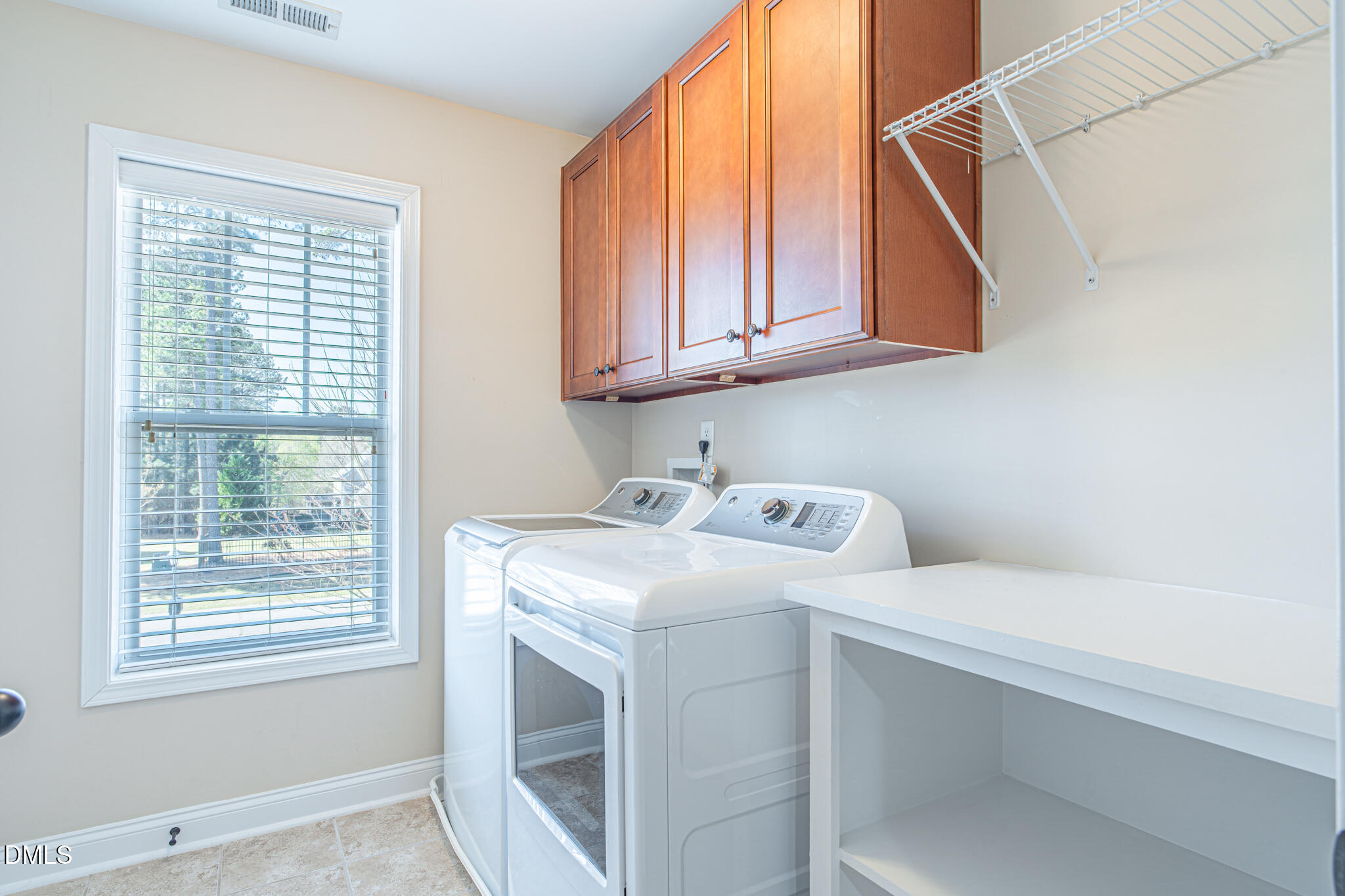403 Rolling Pines Drive Spring Lake, NC 28390 - Photo 34 of 56 a utility room with dryer and washer