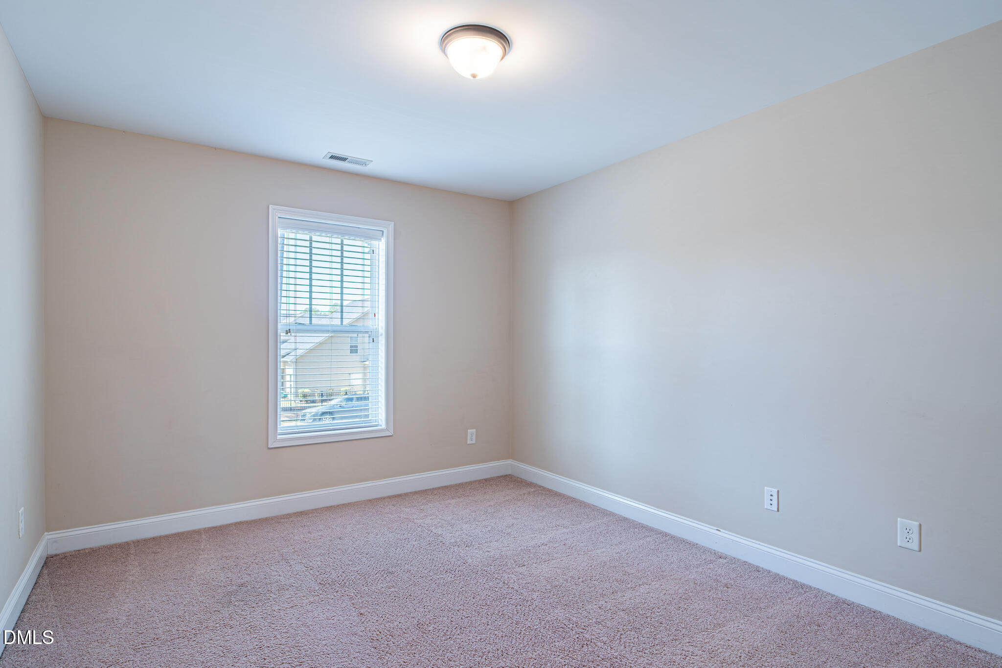 403 Rolling Pines Drive Spring Lake, NC 28390 - Photo 38 of 56 an empty room with windows