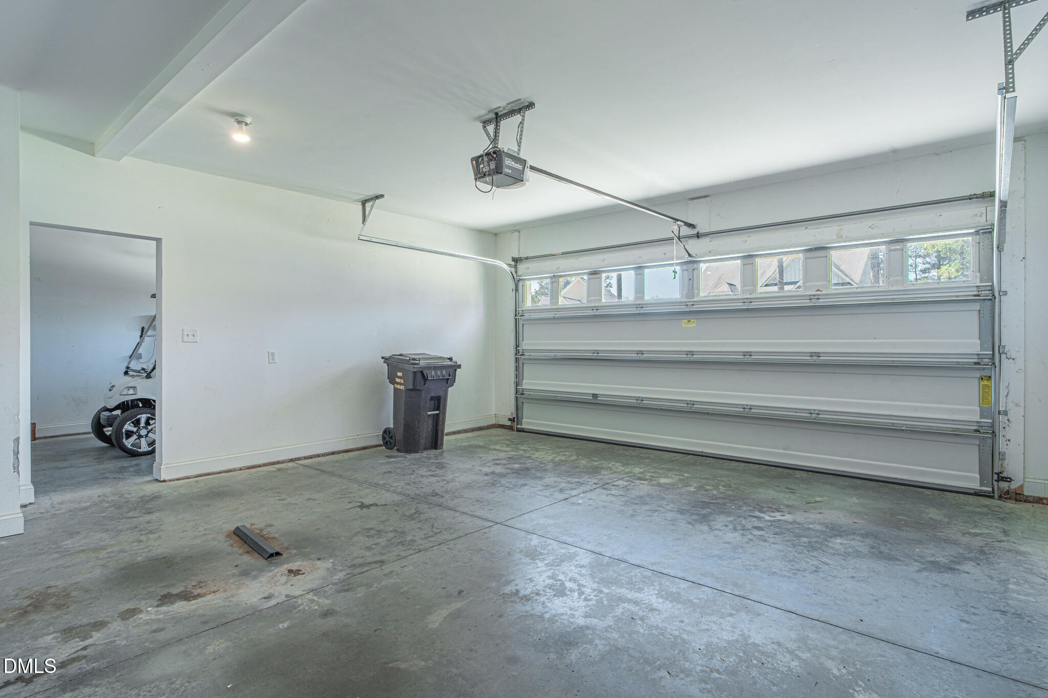 403 Rolling Pines Drive Spring Lake, NC 28390 - Photo 40 of 56 a view of an empty room and chandelier fan