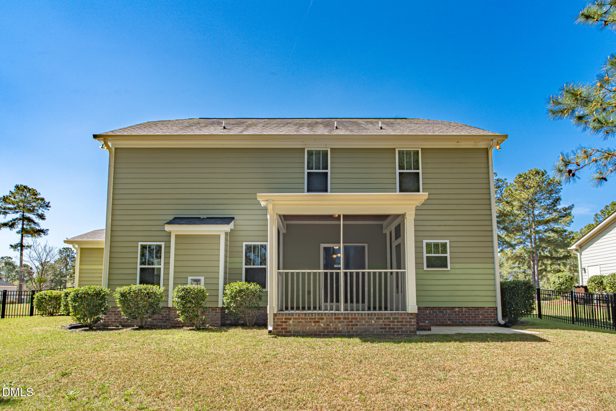 403 Rolling Pines Drive Spring Lake, NC 28390 - Photo 45 of 56 a front view of a house with a yard