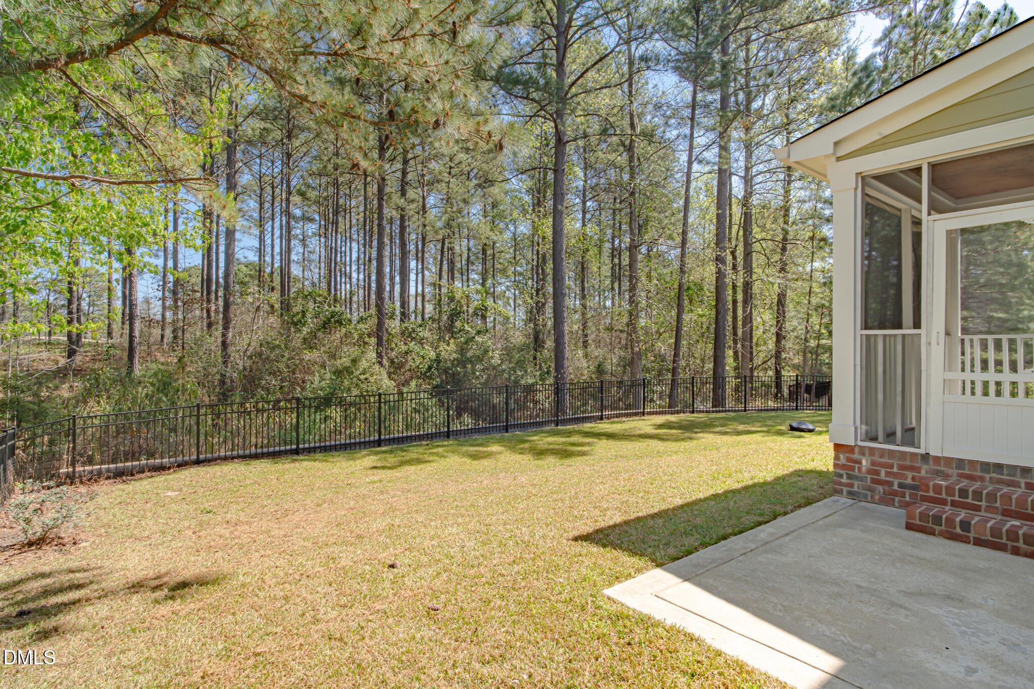 403 Rolling Pines Drive Spring Lake, NC 28390 - Photo 47 of 56 a view of swimming pool with an outdoor space and seating area