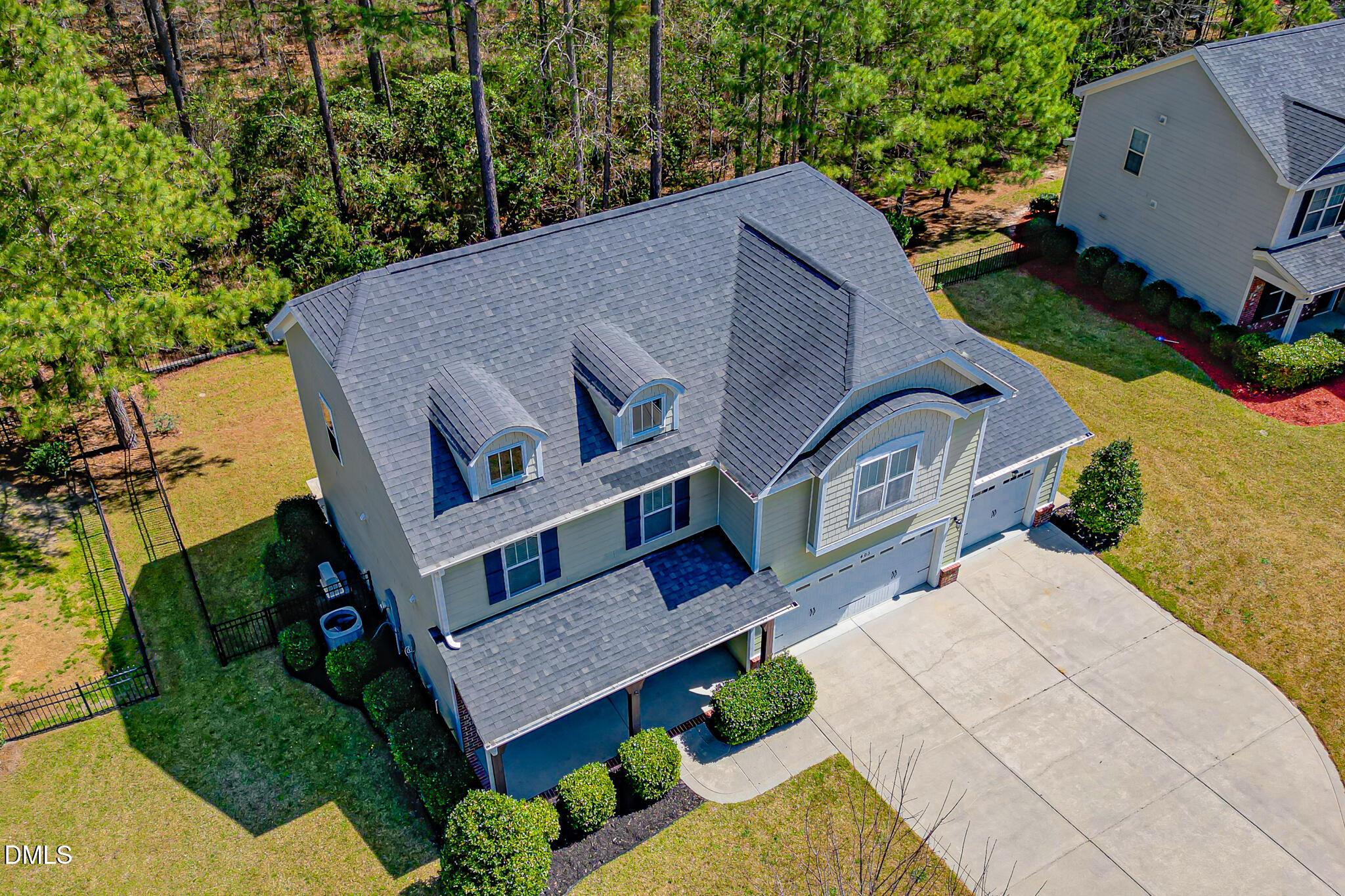 403 Rolling Pines Drive Spring Lake, NC 28390 - Photo 48 of 56 an aerial view of a house with a yard and potted plants