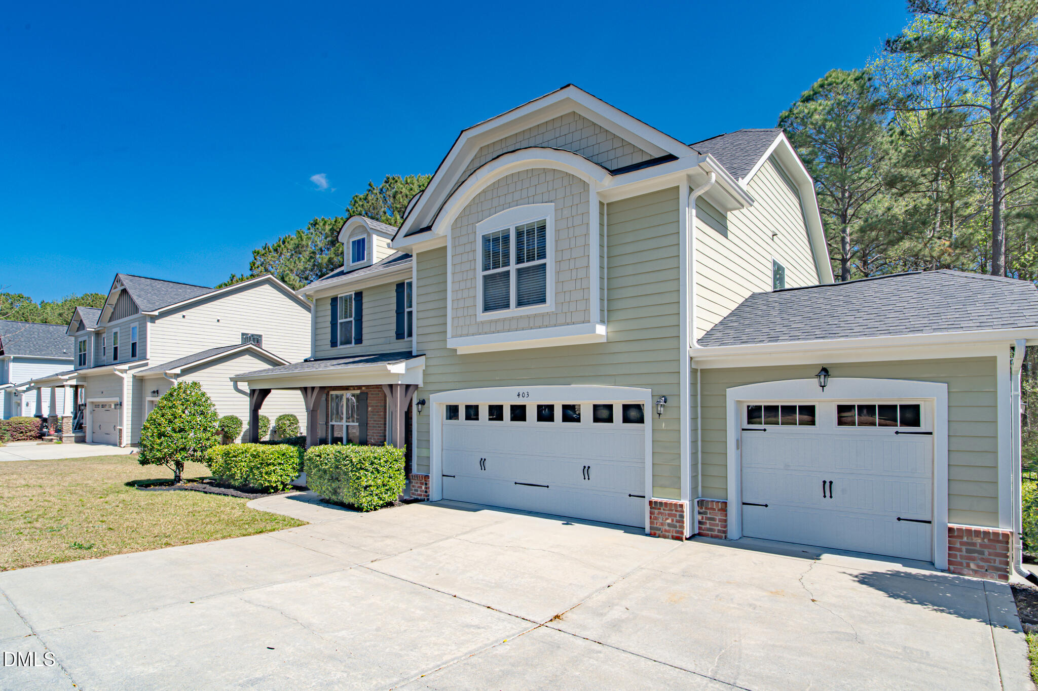 403 Rolling Pines Drive Spring Lake, NC 28390 - Photo 5 of 56 a front view of a house with a yard
