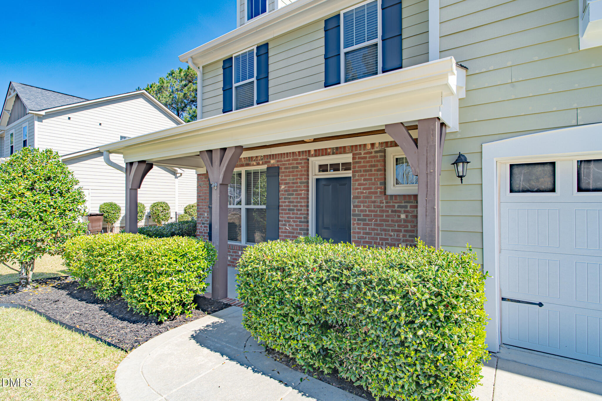 403 Rolling Pines Drive Spring Lake, NC 28390 - Photo 6 of 56 a view of a house with a garden