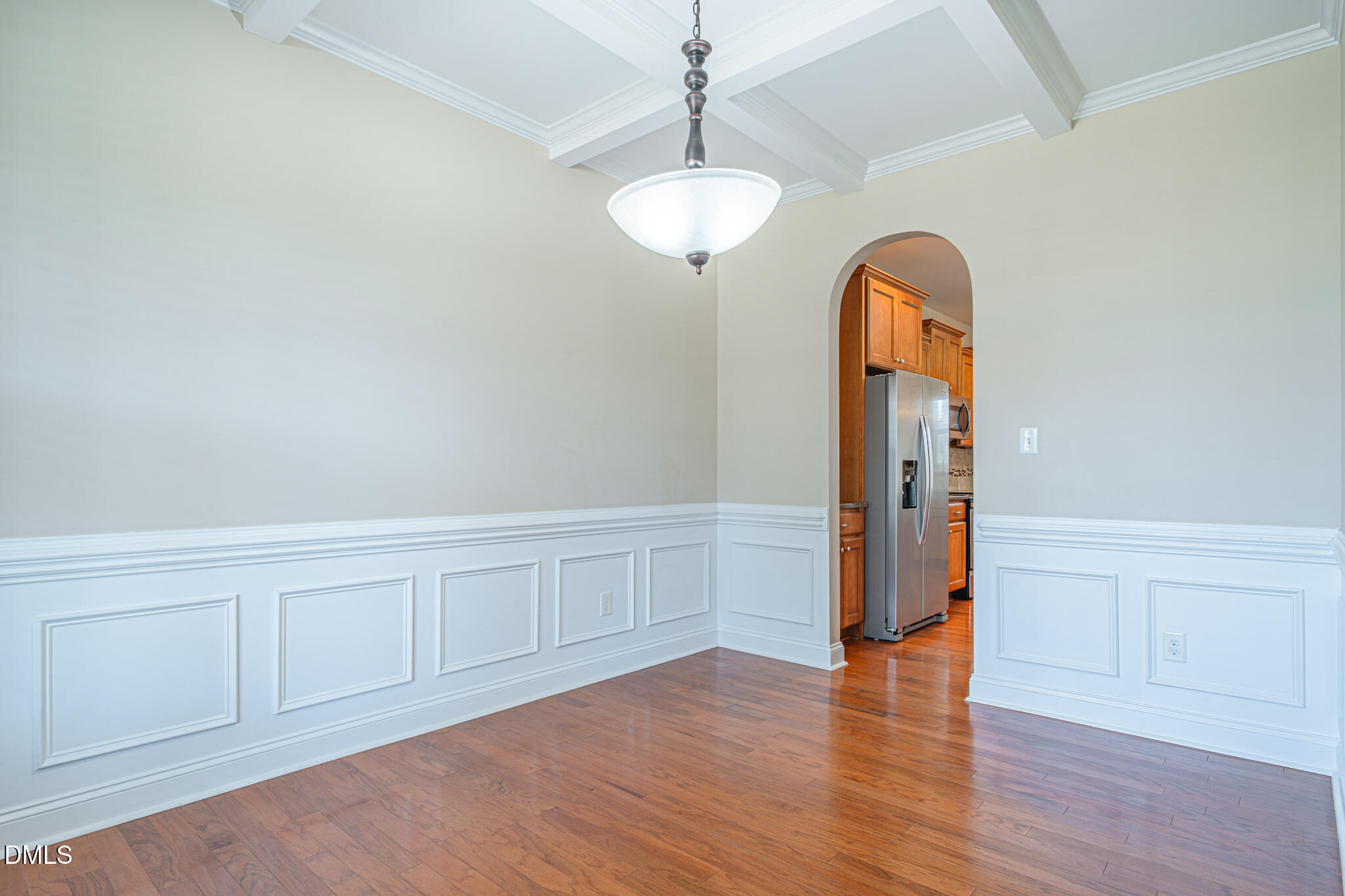 403 Rolling Pines Drive Spring Lake, NC 28390 - Photo 9 of 56 a view of an empty room with wooden floor and a window