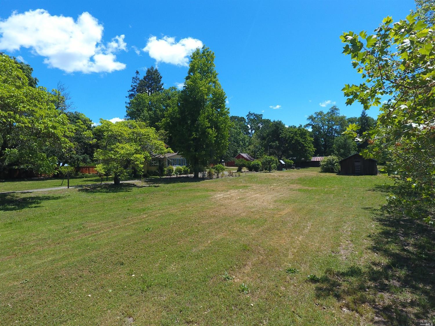 360 Hoff Road Kenwood, CA 95409 - Photo 1 of 1 a view of a golf course with a lake