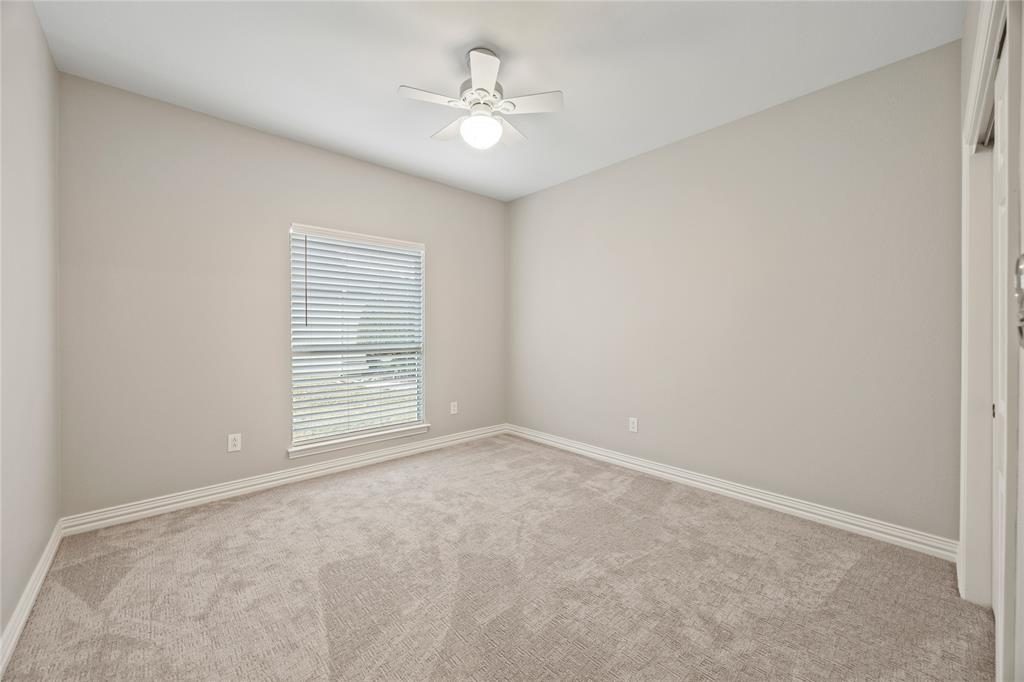 10409 Countryside Drive Denton, TX 76207 - Photo 29 of 38 Secondary Bedroom with carpet and ceiling fan
