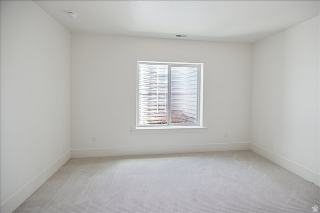 952 Mathilda Drive, Unit 156 Saratoga Springs, UT 84045 - Photo 25 of 25 Guest Bedroom #3 Bright white walls with crisp baseboards, light grey carpet, and a large window with white blinds