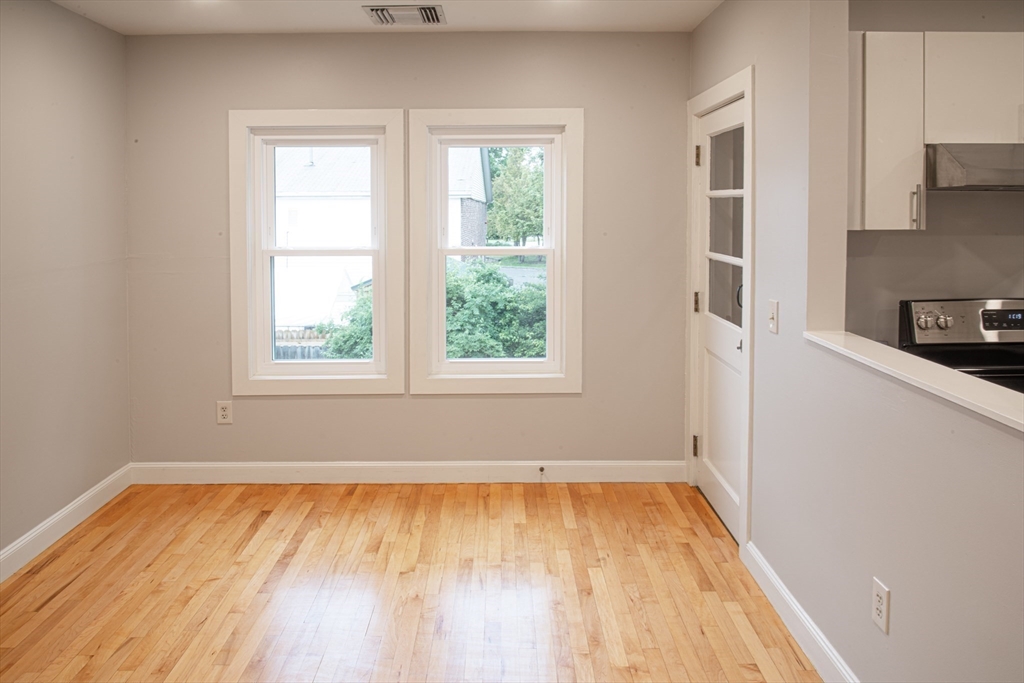 500 West Street, Unit 6 Amherst, MA 01002 - Photo 13 of 20 a view of a room with wooden floor and a window