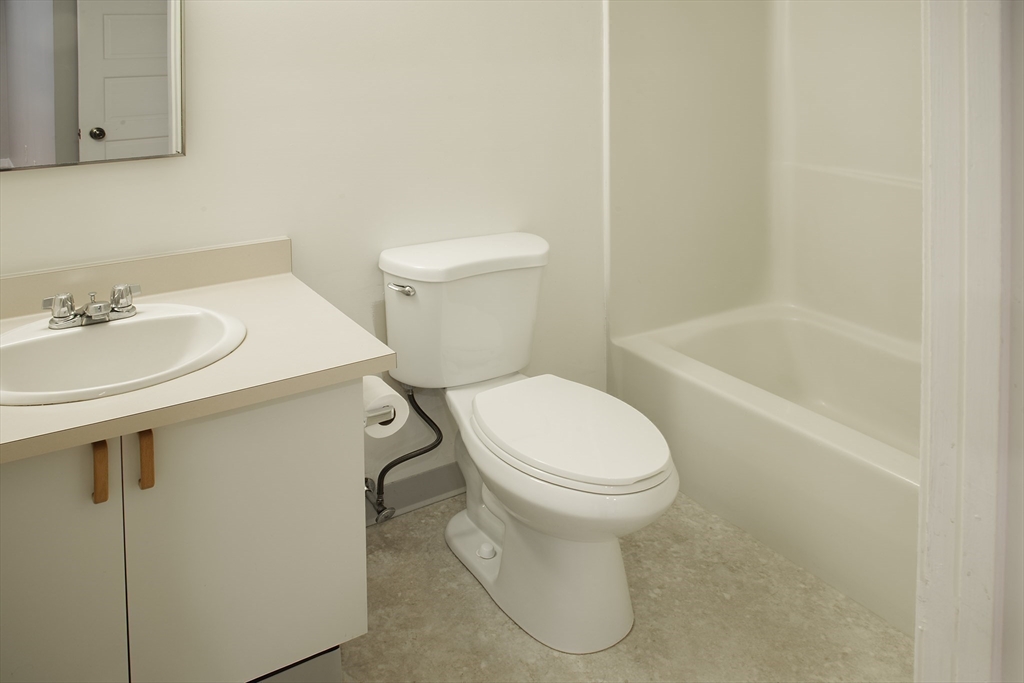 500 West Street, Unit 6 Amherst, MA 01002 - Photo 16 of 20 a bathroom with a sink a toilet and bathtub