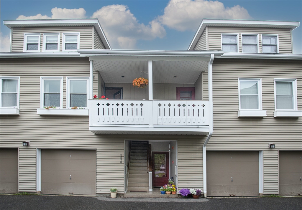 500 West Street, Unit 6 Amherst, MA 01002 - Photo 2 of 20 a front view of a house with a garage