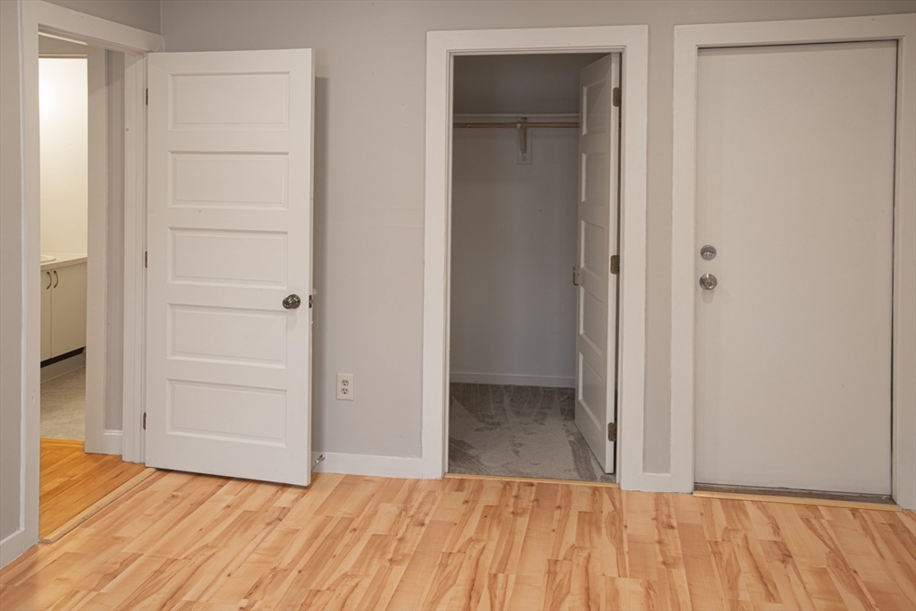 500 West Street, Unit 6 Amherst, MA 01002 - Photo 9 of 20 a view of a room with wooden floor