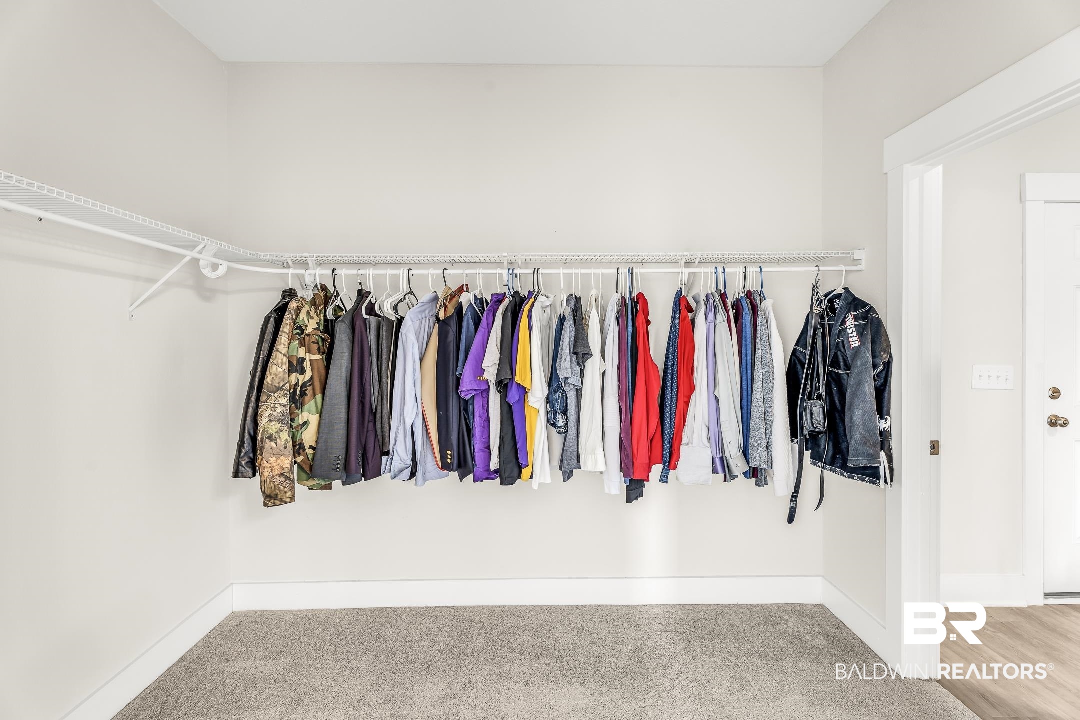1720 Partridge Street Foley, AL 36535 - Photo 20 of 32 Walk in closet with hardwood / wood-style floors