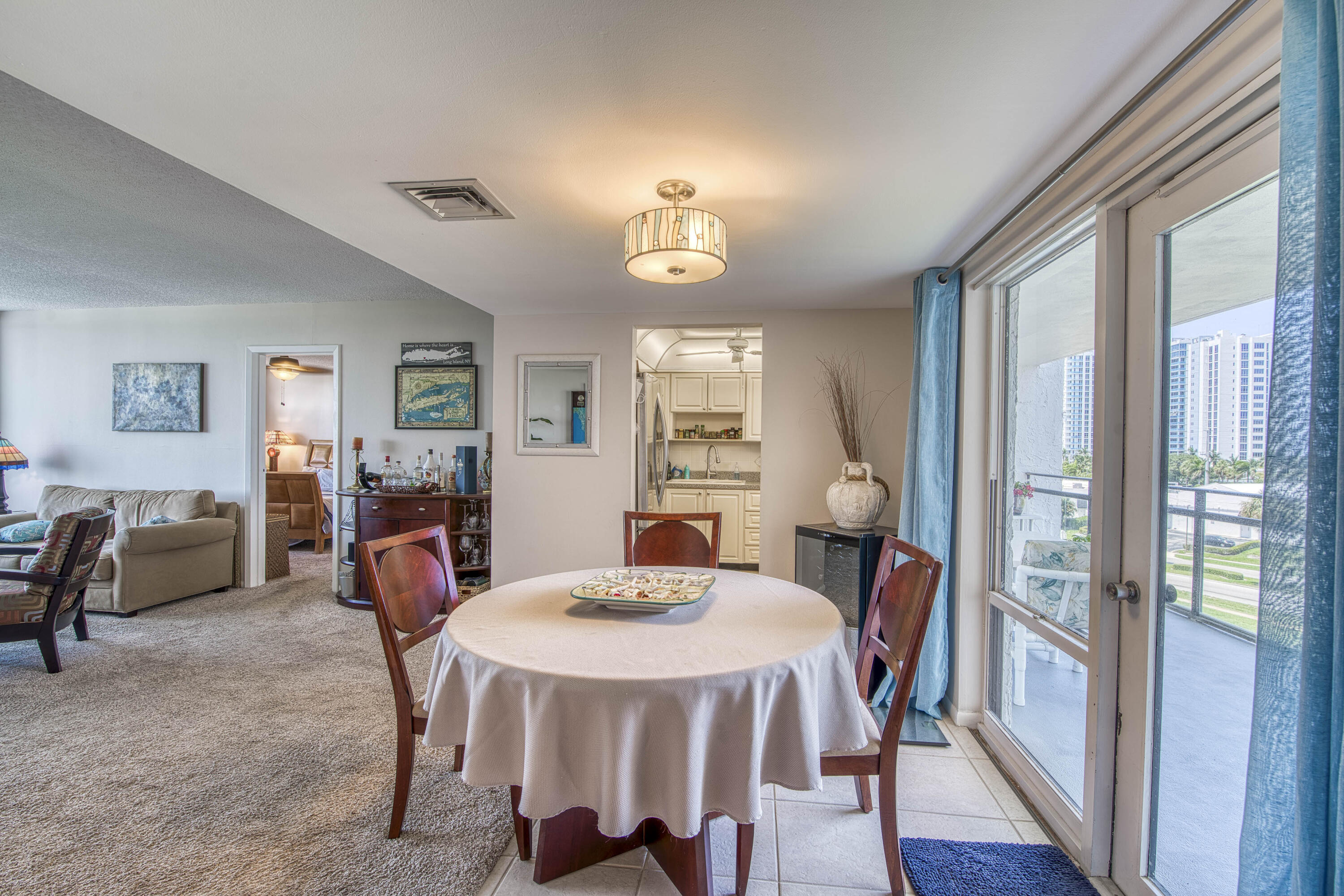 336 Golfview Road, Unit 518 North Palm Beach, FL 33408 - Photo 11 of 31 a view of a dining room with furniture and window