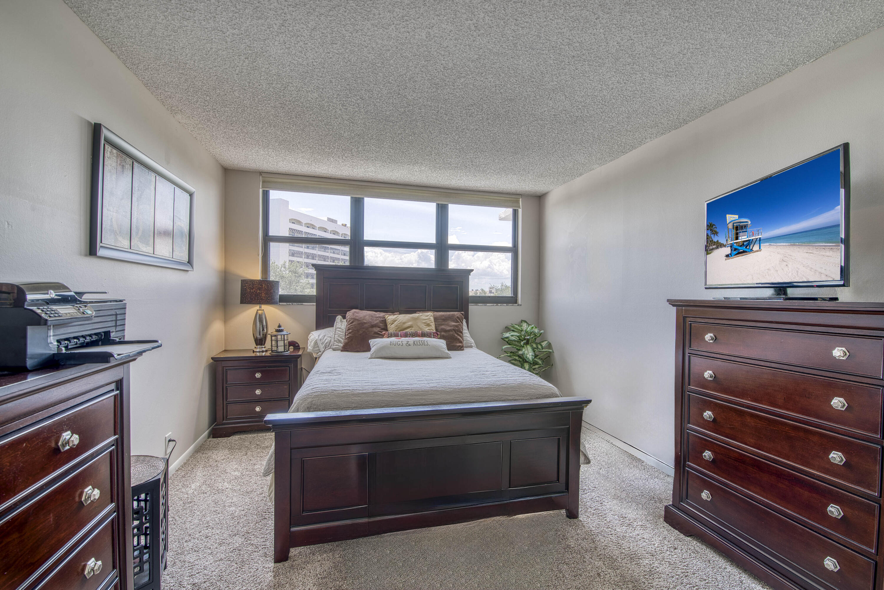 336 Golfview Road, Unit 518 North Palm Beach, FL 33408 - Photo 16 of 31 a bedroom with a bed and a window