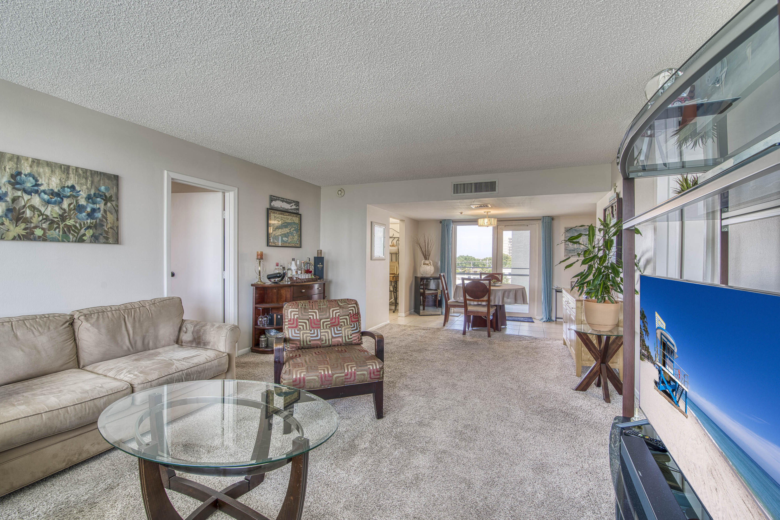 336 Golfview Road, Unit 518 North Palm Beach, FL 33408 - Photo 7 of 31 a living room with furniture and a fireplace