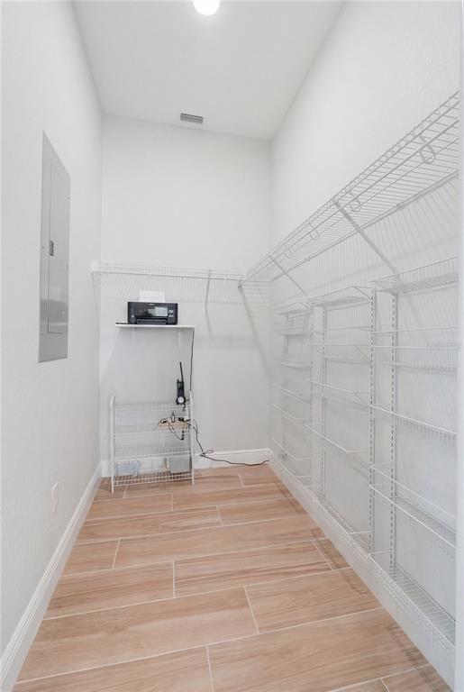 2204 Re Byrd Road Frostproof, FL 33843 - Photo 14 of 49 a view of a room with wooden floor and white walls