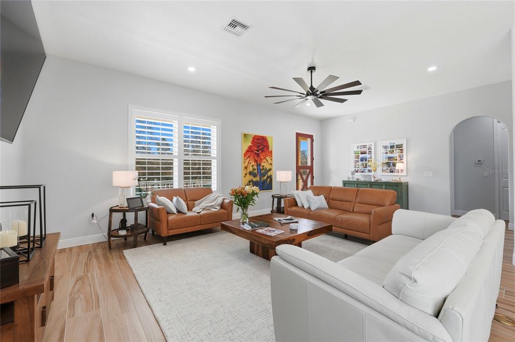 2204 Re Byrd Road Frostproof, FL 33843 - Photo 6 of 49 a living room with furniture and a large window