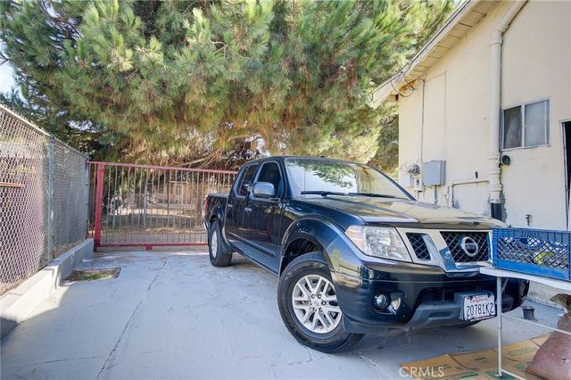 a car parked in front of a house