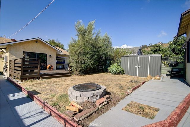 a view of outdoor space yard and swimming pool