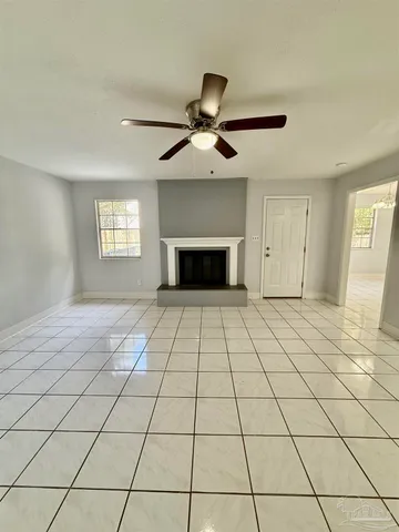 a view of an empty room and window