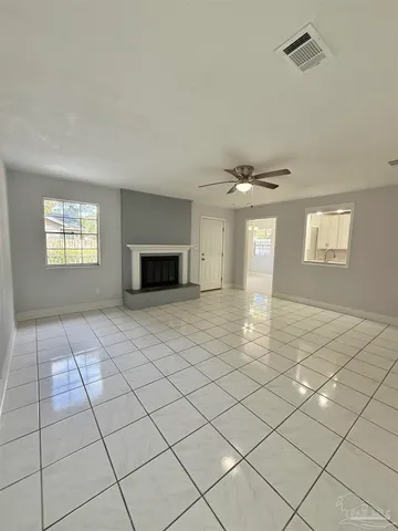 a view of an empty room and window