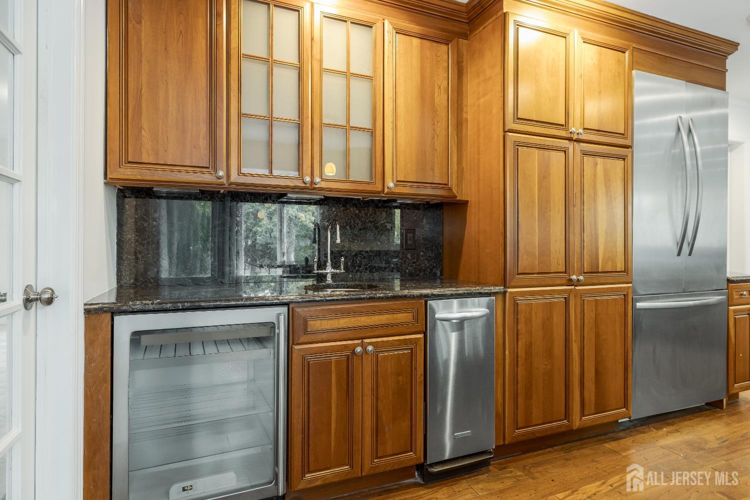 28 Southfield Road Edison, NJ 08820 - Photo 15 of 27 a kitchen with stainless steel appliances granite countertop a refrigerator and cabinets