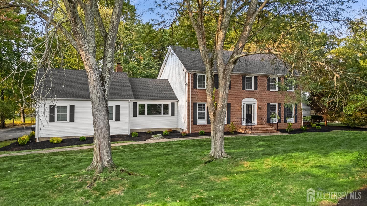 28 Southfield Road Edison, NJ 08820 - Photo 18 of 27 a front view of a house with a yard