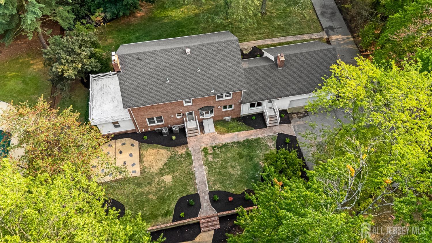 28 Southfield Road Edison, NJ 08820 - Photo 19 of 27 an aerial view of a house with a yard