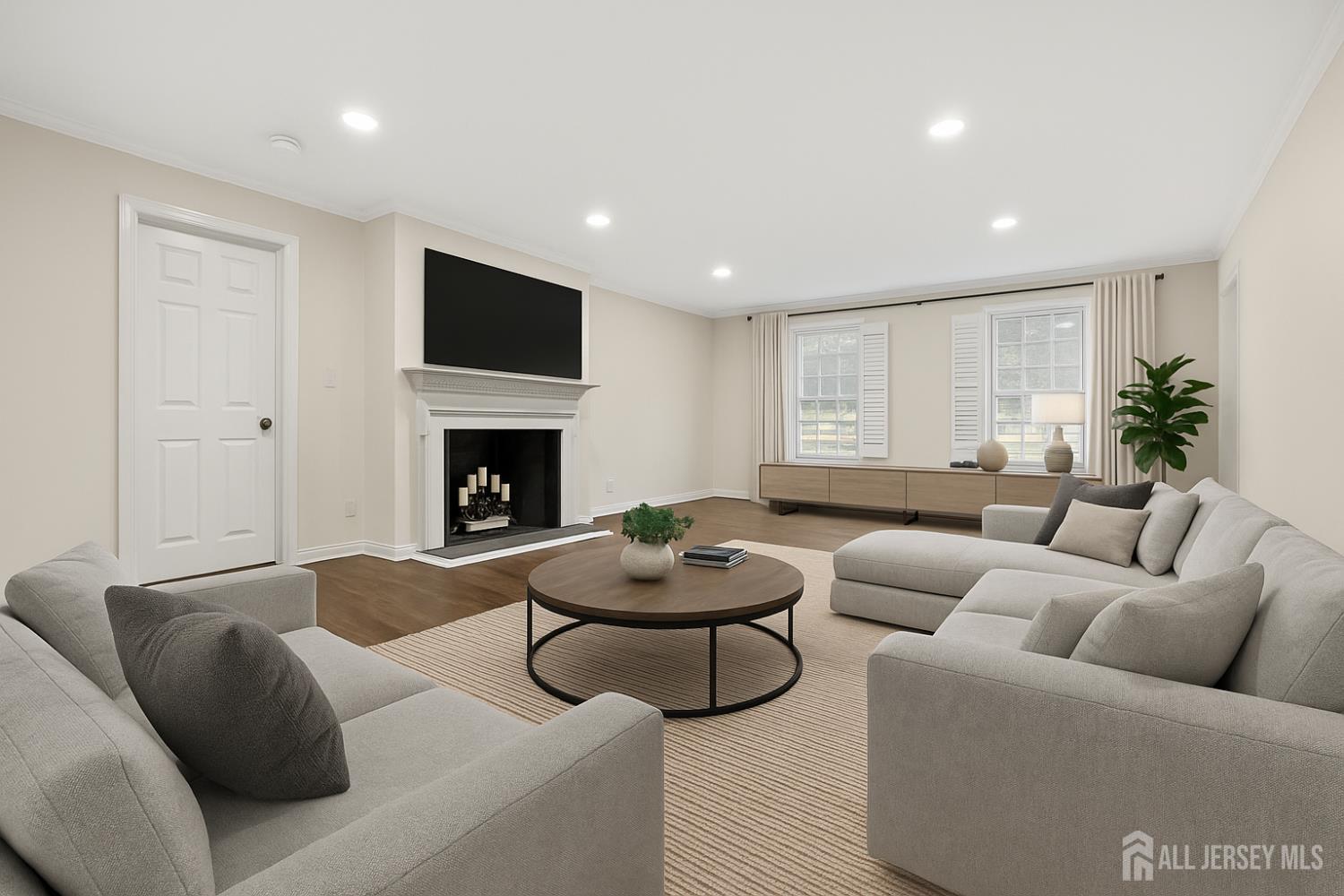 28 Southfield Road Edison, NJ 08820 - Photo 2 of 27 a living room with furniture and a fireplace