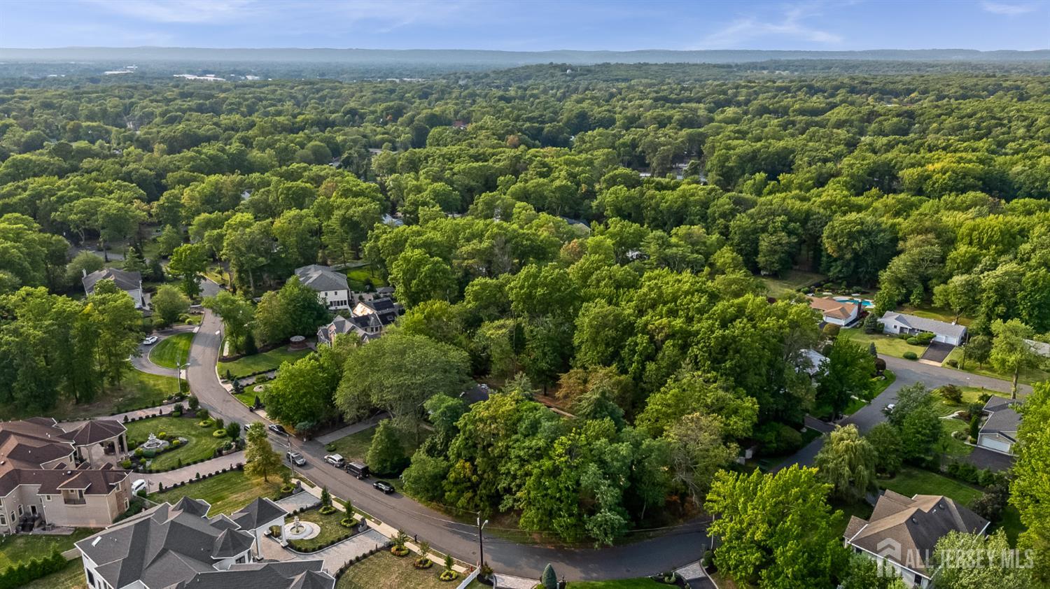 28 Southfield Road Edison, NJ 08820 - Photo 21 of 27 an aerial view of a house with a yard