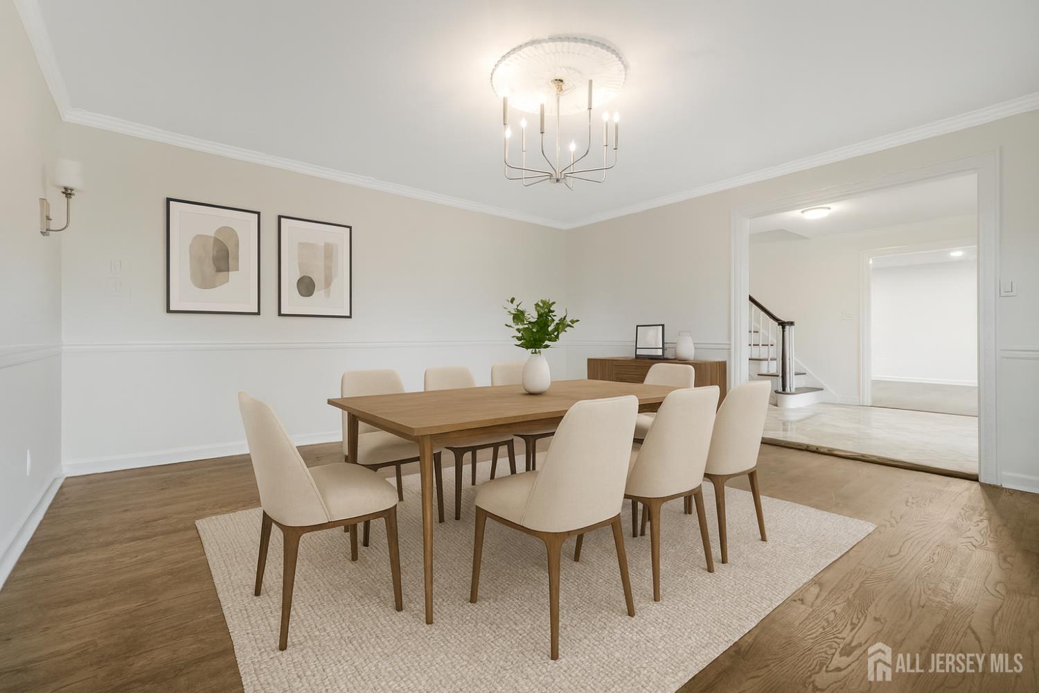 28 Southfield Road Edison, NJ 08820 - Photo 3 of 27 a view of a dining room with furniture and wooden floor