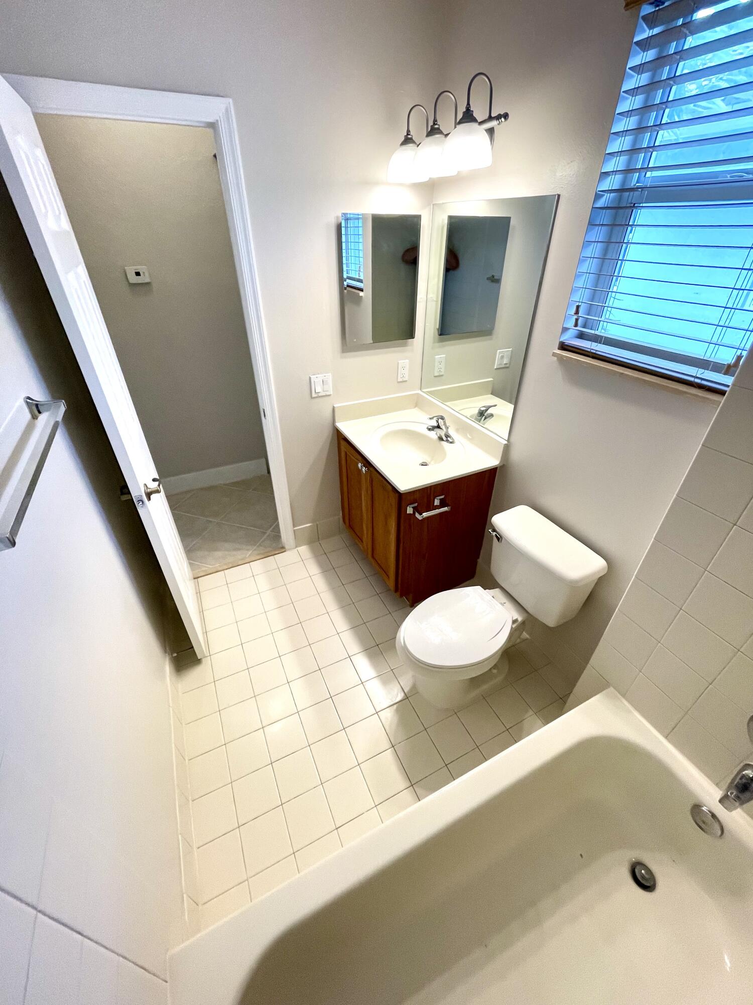 3043 Laurel Ridge Circle Riviera Beach, FL 33404 - Photo 27 of 35 SECOND BATHROOM1