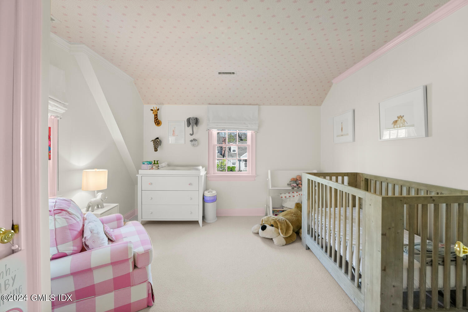 46 Terrace Avenue Riverside, CT 06878 - Photo 13 of 17 a bedroom with furniture and a baby crib