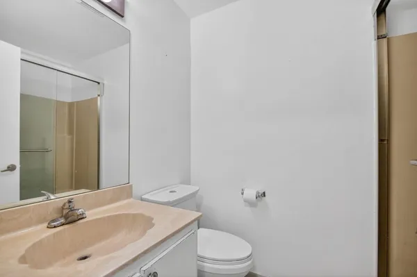a room with furniture and a flat screen tv