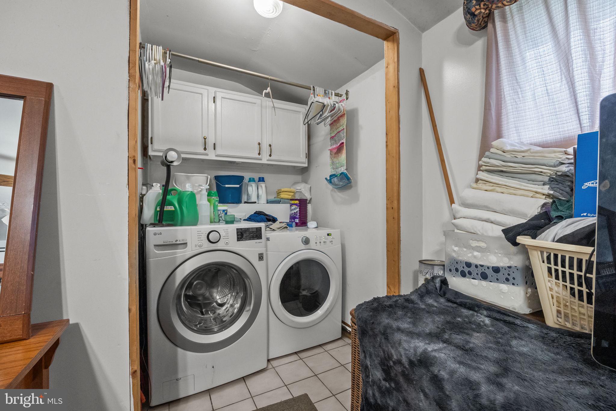 65 Silverspruce Road Levittown, PA 19056 - Photo 16 of 32 a view of storage and utility room with washer and dryer