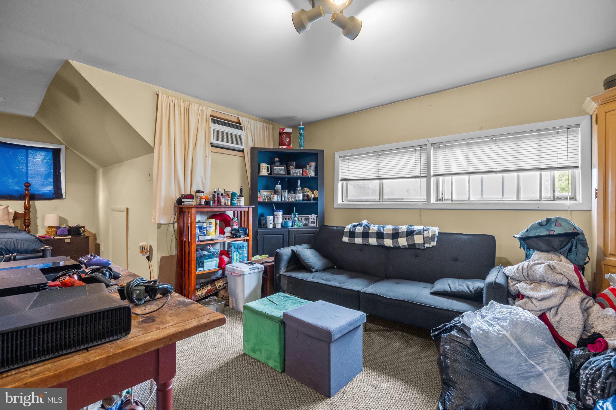 65 Silverspruce Road Levittown, PA 19056 - Photo 25 of 32 a living room with furniture and a window