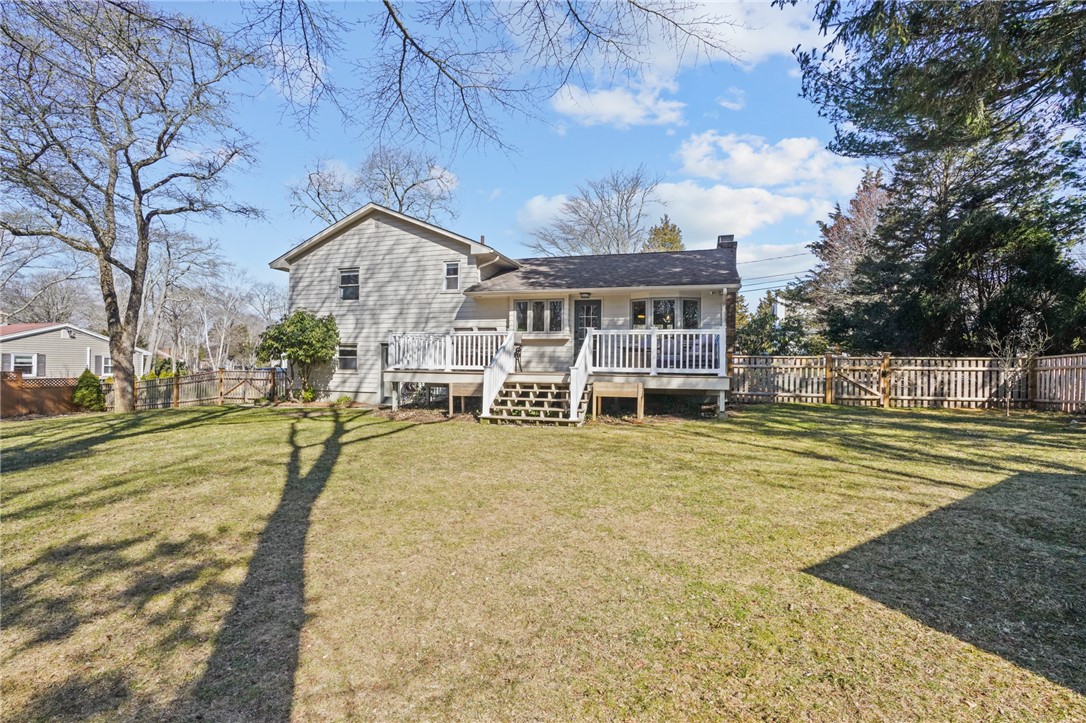 12 Duffield Road Bristol, RI 02809 - Photo 35 of 39 Back facade from stone wall