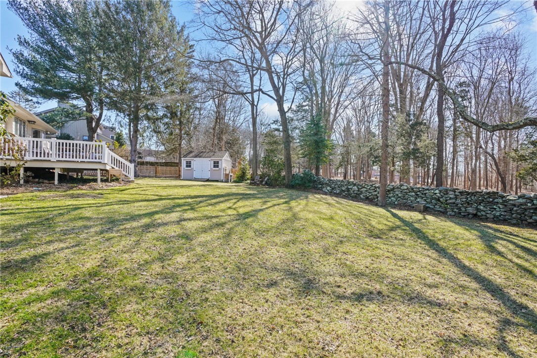 12 Duffield Road Bristol, RI 02809 - Photo 39 of 39 View from side yard to back wall