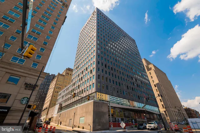 a city view with tall buildings