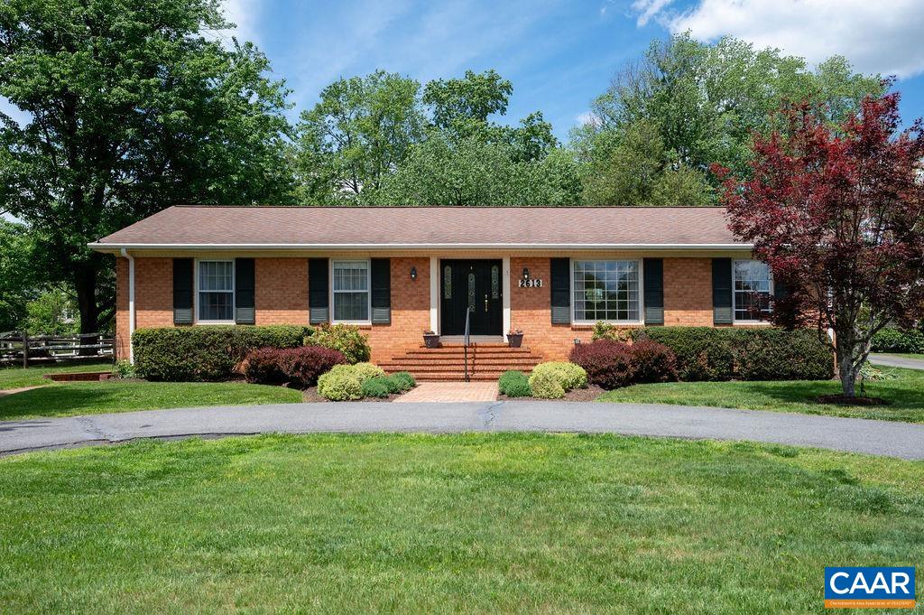 2613 Huntington Road Charlottesville, VA 22901 - Photo 1 of 53 a front view of a house with a yard