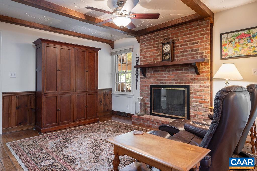 2613 Huntington Road Charlottesville, VA 22901 - Photo 11 of 53 a living room with furniture and a fireplace