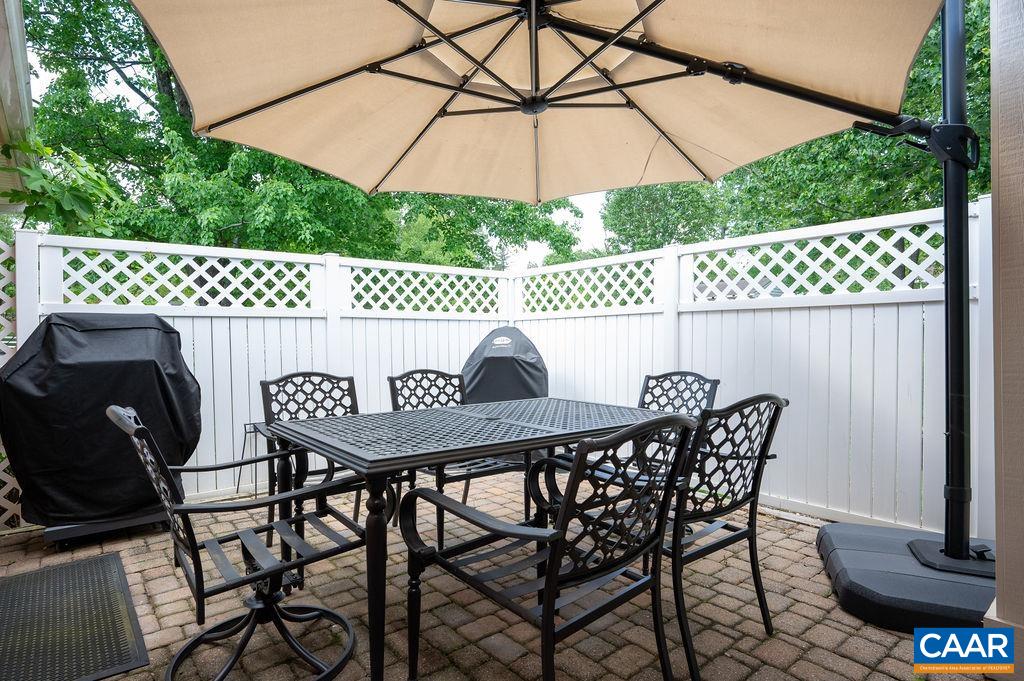 2613 Huntington Road Charlottesville, VA 22901 - Photo 19 of 53 a view of a chairs and table in patio with a fire pit