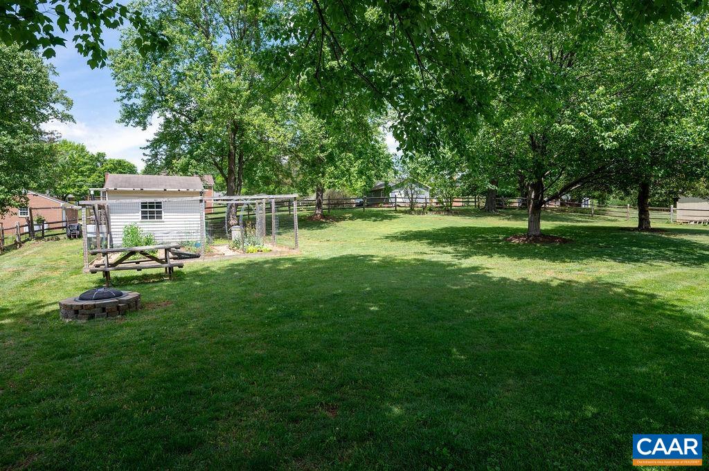 2613 Huntington Road Charlottesville, VA 22901 - Photo 39 of 53 a house view with a sitting space and garden