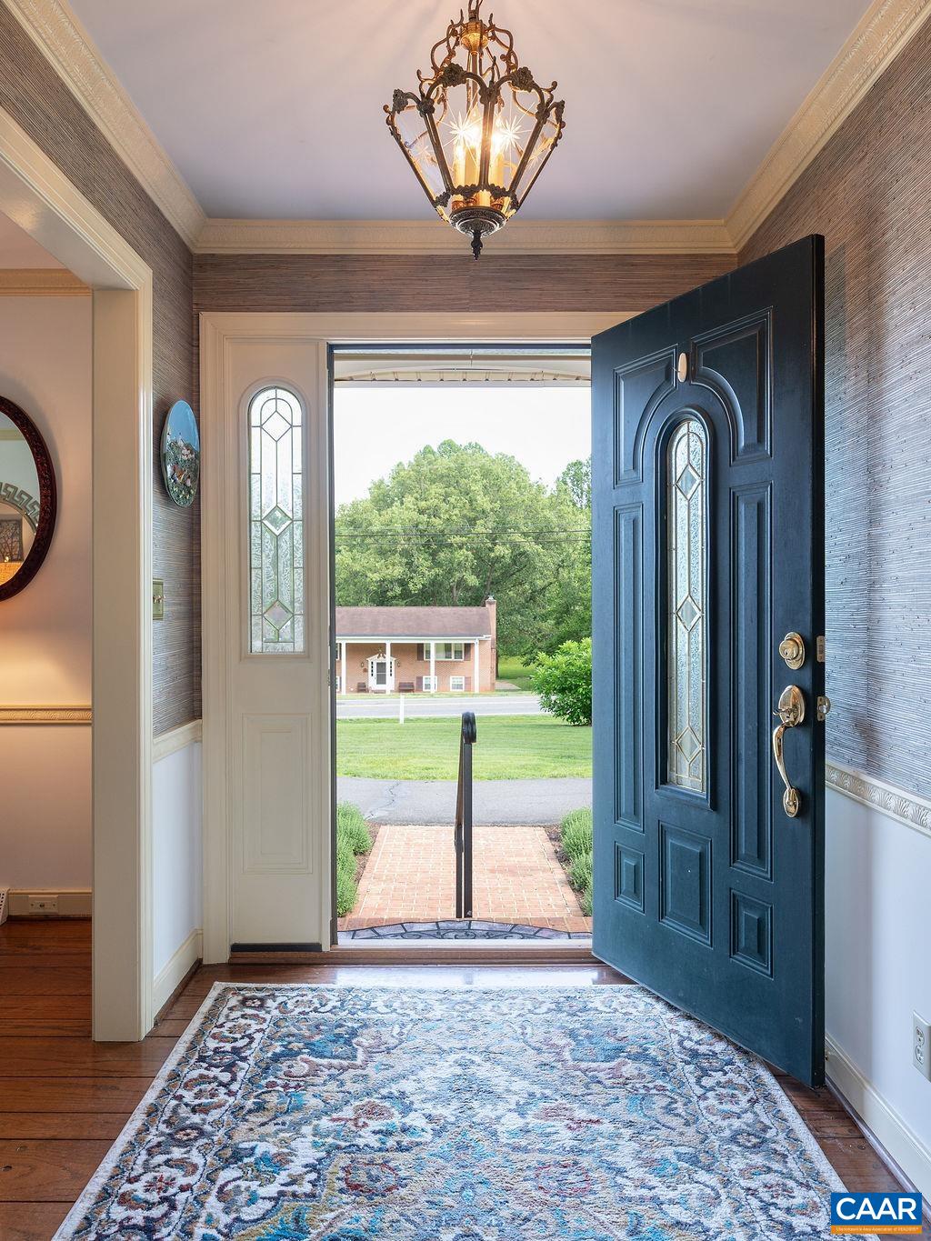 2613 Huntington Road Charlottesville, VA 22901 - Photo 4 of 53 a view of a entryway door with a porch