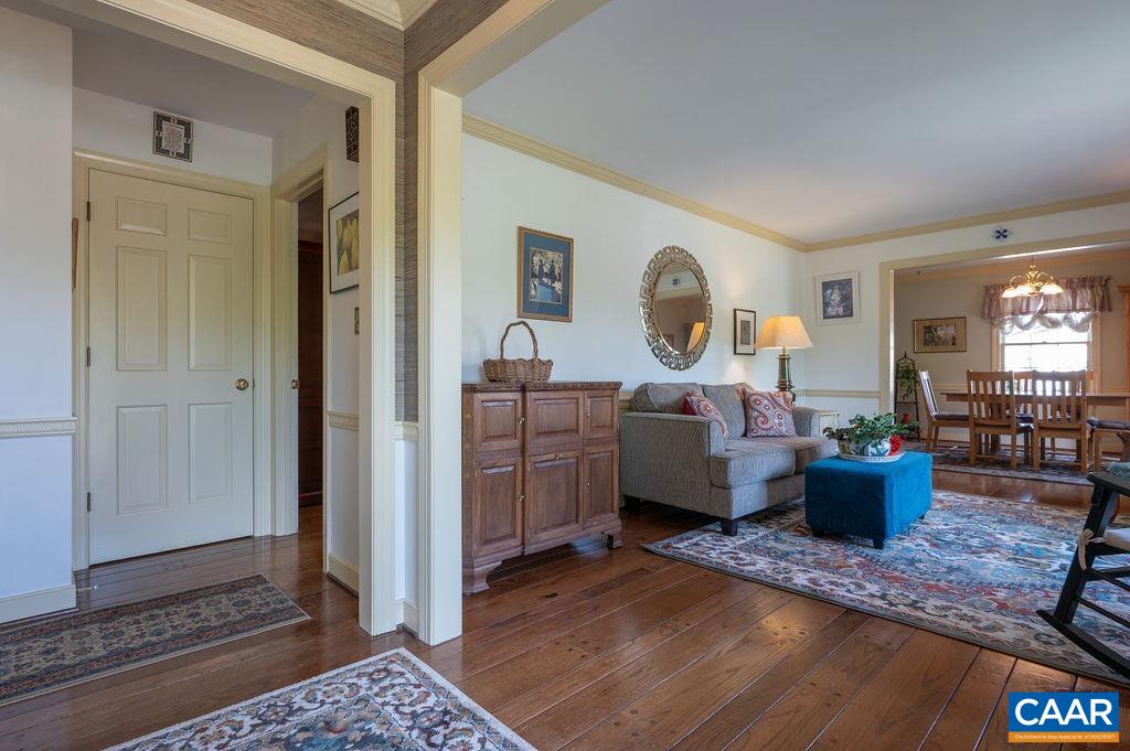 2613 Huntington Road Charlottesville, VA 22901 - Photo 5 of 53 a living room with furniture and wooden floor