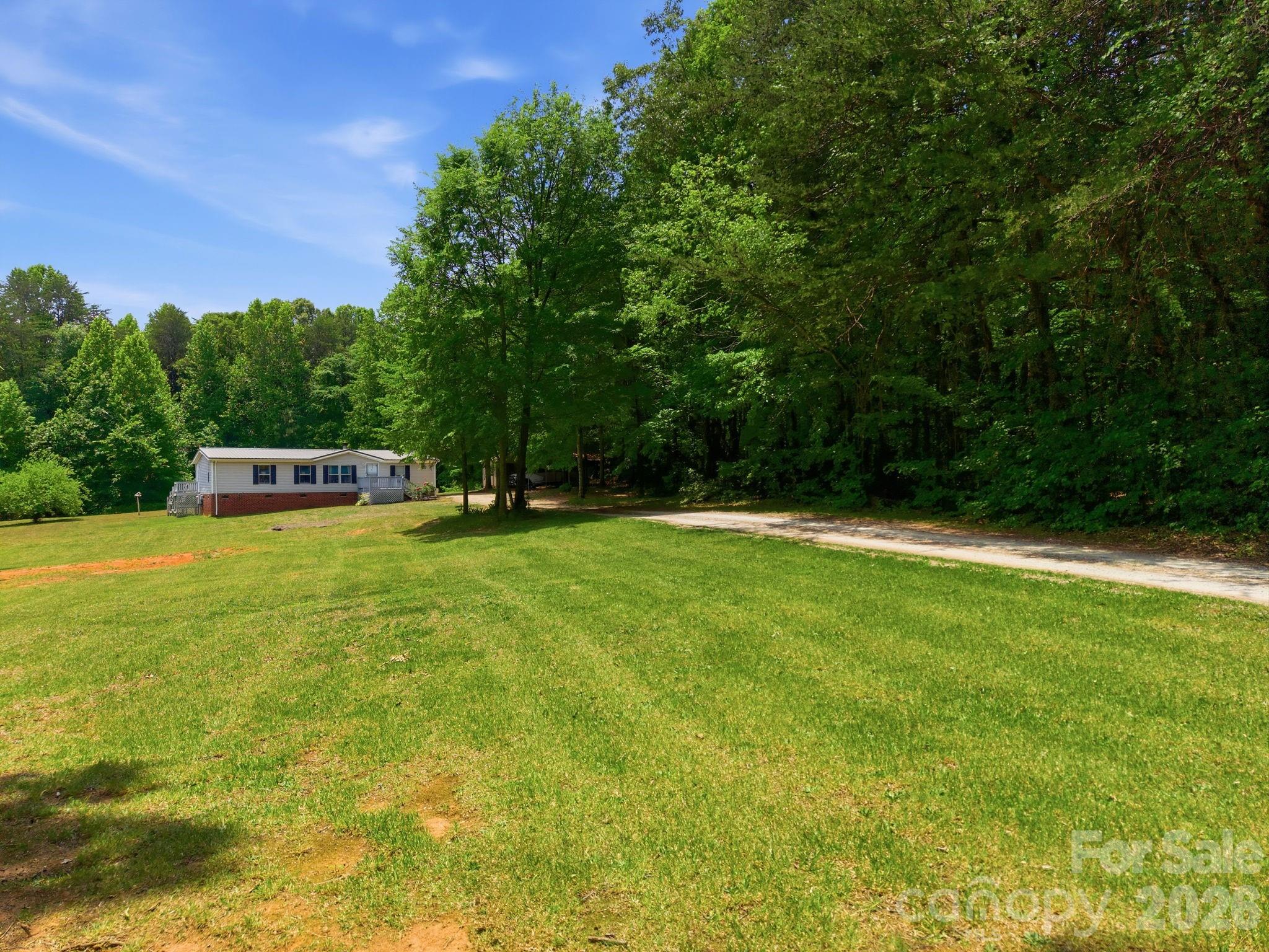 675 Overcash Road Salisbury, NC 28147 - Photo 6 of 48 a view of a house with a big yard